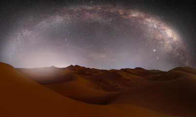 Obraz na płótnie Canvas Amazing milky way over the sand dunes of Sahara Desert - Sahara, Morocco