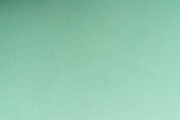 Structural green plaster. Creative vintage background.