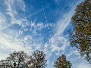 Stunning cirrus cloud formation panorama in a deep blue sky