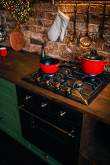 Christmas bright stylish Scandinavian style kitchen. The concept of a decorated cozy home for the holidays.