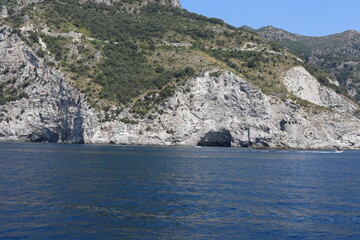 view of the sea and mountains. view of the coast of island. coast of the region. landscape with mountains and sea. landscape with blue sky and clouds. sea and rocks