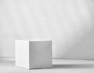 Gray cube on a concrete background. Background for product presentation