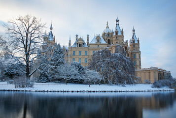 The Schwerin fairytale castle in the snow in germany winter 