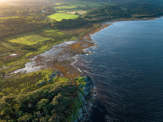 Calm Waters Aerial View of the Scottish Coast at Sunset