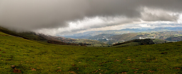 Mountainous landscape in the Irati jungle just beginning the rain, Navarrese Pyrenees, Spain