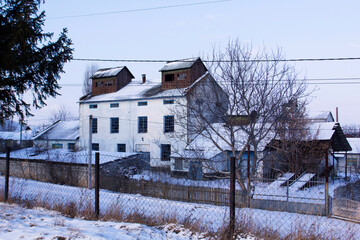 Winter landscape at sunrise or sunset with a hundred mills.