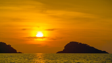 Naklejka na ściany i meble Beautiful sunset on Koh Chang Island in Thailand