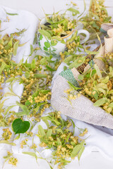 Dried linden tree flowers for herbal tea, organic herbs for preparing tea, herbs and alternative medicine concept