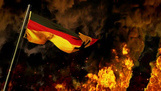 waving Germany flag on burning fire backdrop - problem concept