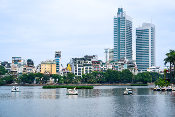 Fototapeta premium Vietnam, city of Hanoi, view from the Trúc Bạch Lake on the city buildings