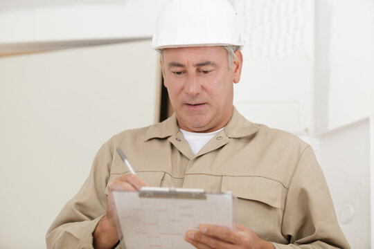 a builder in with clipboard - Powered by Adobe