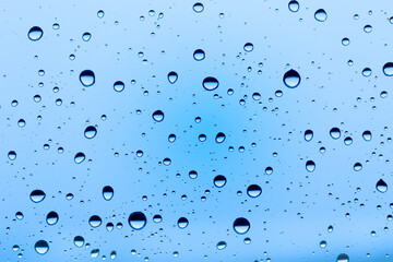 Water drops on a blue window