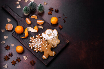 Beautiful Christmas decorations with holiday toys, clementines and gingerbread