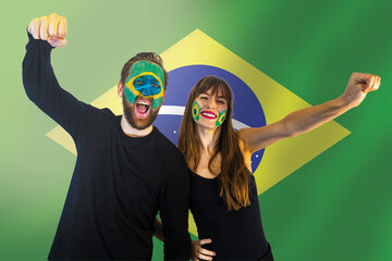 fans of the brazil football team celebrate winning a match during the world championships; happy...