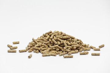 Fraction of feed additives for animals on a white background in the form of a pyramid