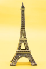 Eiffel Tower, Paris, France. Isolated in yellow background.