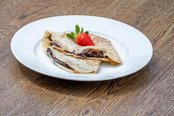 pancake with chocolate and strawberry
