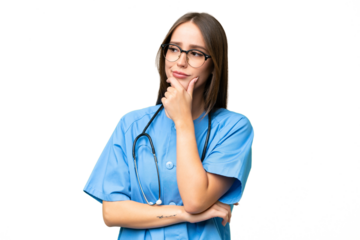 Young nurse caucasian woman over isolated background having doubts and with confuse face expression