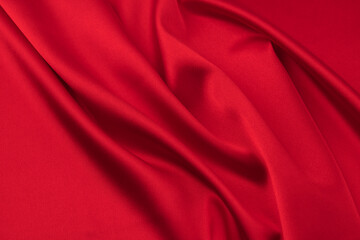 Fototapeta na wymiar red satin or silk fabric as background