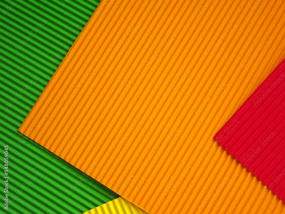 Canvas Prints The corrugated surface is multicolored with parallel lines as a background black blue orange crimson pink light green orange and purple