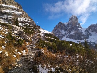hiking in dolomiti di brenta in the beginning of winter