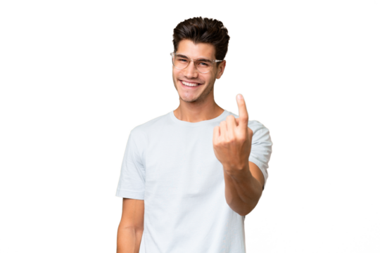 Young caucasian handsome man over isolated background doing coming gesture