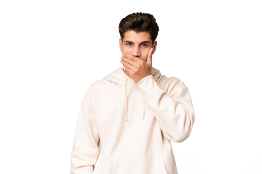 Young caucasian handsome man over isolated background covering mouth with hand