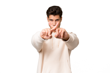 Young caucasian handsome man over isolated background making stop gesture with her hand to stop an act