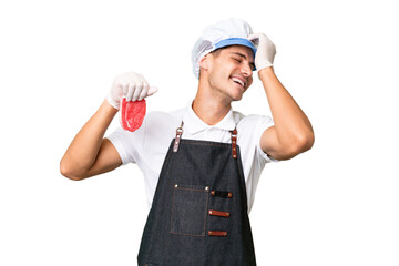 Butcher caucasian man wearing an apron and serving fresh cut meat over isolated background has realized something and intending the solution