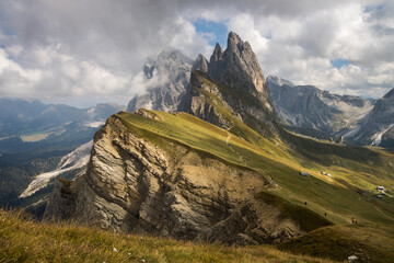 Clouds over mountain massif Odle in Dolomites - obrazy, fototapety, plakaty