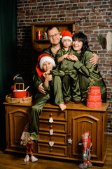 Obraz na płótnie Canvas Family at Christmas kitchen