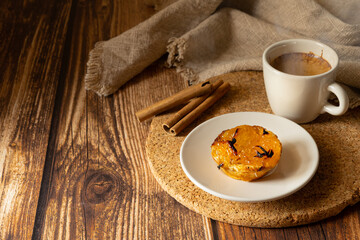 Typical Portuguese dessert pastel de chila - pastry tart of squash with a cup of hot coffee....
