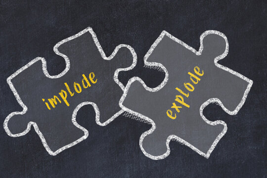 Chalk drawing of two puzzles with words implode and explode