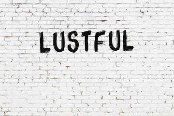 White wall with black paint inscription lustful on it - obrazy, fototapety, plakaty