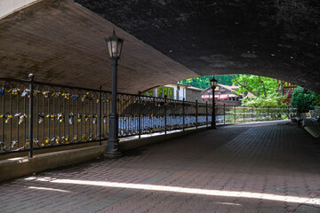 Fototapeta premium Helen Georgia Cityscape with the Chattahoochee River and tourist locks under the bridge