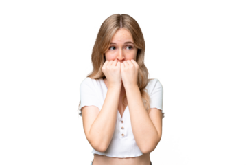 Young English woman over isolated background nervous and scared putting hands to mouth