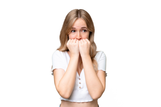 Young English woman over isolated background nervous and scared putting hands to mouth