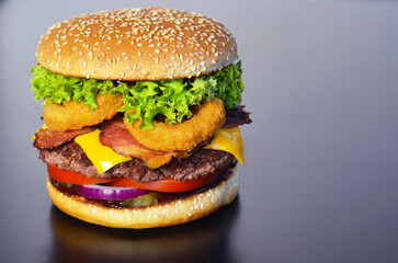 appetizing burger on a black background 91