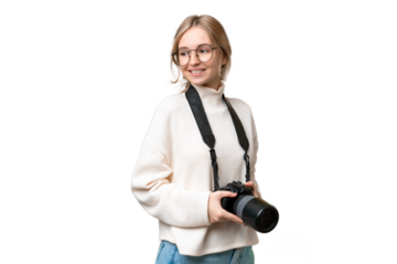 Young photographer English woman over isolated background with arms crossed and happy