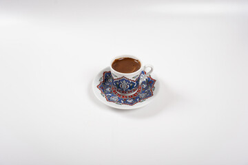 Obraz na płótnie Canvas Traditional turkish coffee, traditional vintage porcelain cup on isolated white background
