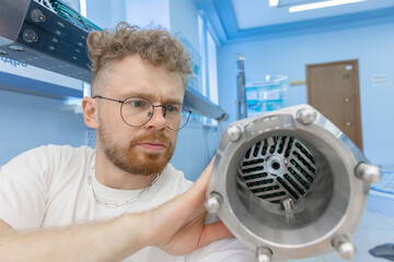 Man engineer background fragment energy fuel uranium or thorium rod element of nuclear reactor water
