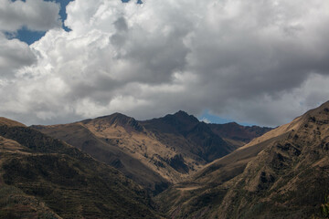 View of the mountains of Limatambo with incredible huge white clouds, Peru. 