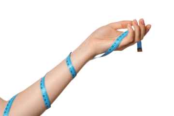 The female hand is wrapped with a measuring tape. The concept of weight loss or diet.