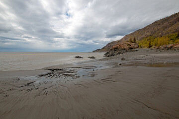 Mud beach at low tide at Beluga Point whale watching site on the Seward Highway near Anchorage Alaska United States
