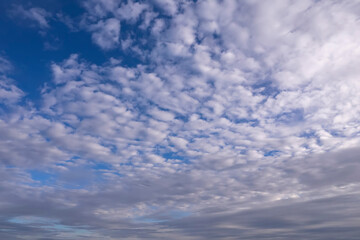 Blue sky with white clouds. Nature background for design purpose.