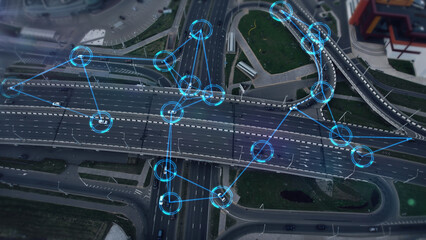 Concept of smart cars and transportation of the future. Automated robotic system remotely controls self-driving cars in the city. Artificial Intelligence Digitalizes and Analyzes Roads. Aerial view.