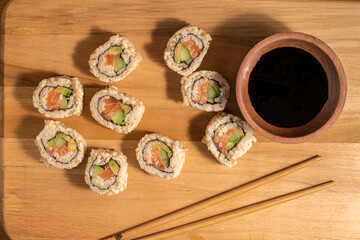 brown rice salmon roll  with soy sauce,