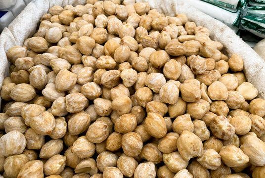 Candlenut (Aleurites moluccana (L.) Wild.), is a plant whose seeds are used as a source of oil and spices. candlenut sold in the market