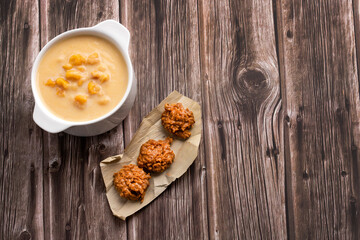 Fototapeta premium Typical Colombian food - Paisa corn mazamorra with sweet coconut and milk paste