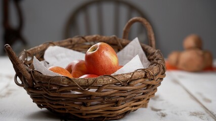 Apples basket on the table. 